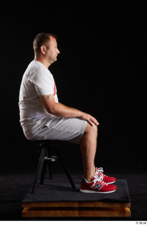 Louis  2 dressed grey shorts red sneakers sitting sports white t shirt whole body 0005.jpg